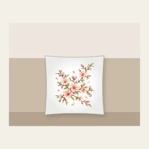 Peach Blossom Branches on Cream Pillow in white: Peach blossoms and slender branches in peach, rose and pale green rest on a glossy cream ground.