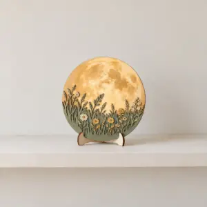 Moonrise Meadow Two-Layer Wood Sign with a large moon rising over a grassy meadow with small flowers in warm gold and sage, layered wood