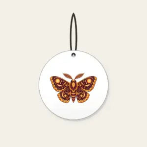 Glowing Amber Moth Ceramic Ornament in white: A large moth with intricately patterned wings, each marked with a glowing circle in amber and plum.