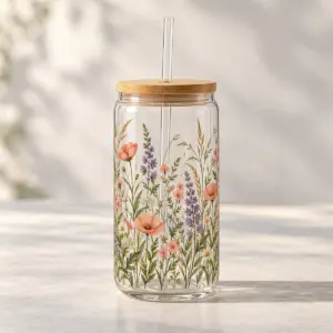 Wildflower Sipper Glass with wrap band of wildflowers and tall grasses in coral, lilac and green, 16oz with lid version
