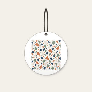 Chip Terrazzo in Terracotta and Navy Ceramic Ornament in white: An all-over terrazzo of chips in terracotta, sage, navy and cream on a warm white field.