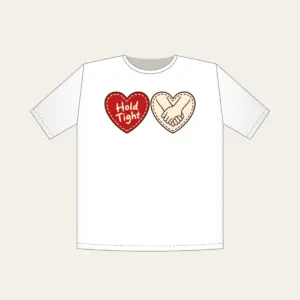 Hold Tight Heart and Hands T-Shirt in white: A red dashed heart marked “Hold Tight” on one side and two clasped cream hands in brown on the other.
