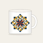 Star Medallion Patchwork Mug in white: An eight-point star medallion in navy, cream and rust with mustard and sage patchwork squares.