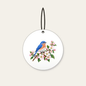 Bluebird on a Blossom Branch Ceramic Ornament in white: A small bluebird rests on a branch of cobalt, white and pale pink blossoms.