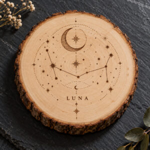 Round wood slice with an engraved-look constellation and the name LUNA