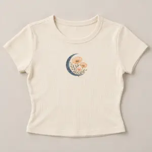 Moon Garden Ribbed Baby Tee with small chest print: an ink-blue crescent moon cradling three delicate apricot poppies and fine olive stems
