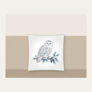 Snowy Owl on a Frosted Branch Pillow in white: A snowy owl on a frosted branch in white, grey and ice blue.