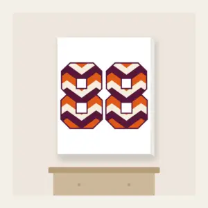 Plum Chevron Panels with Number 88 Canvas Print in white: Bold chevron panels in plum, burnt orange and cream, with the number “88” standing out in the middle.
