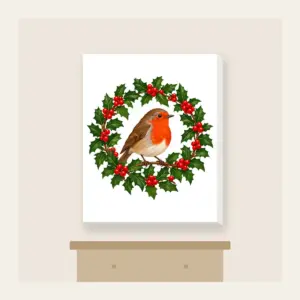 Robin in a Holly Wreath Canvas Print in white: A robin perches in a holly wreath in red, brown and green.