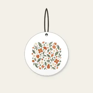 Garden Terrazzo of Leaves and Blossoms Ceramic Ornament in white: An all-over terrazzo of leaves, pebbles and blossoms in terracotta, sage and cream.