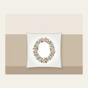 Oval Rose Wreath in Blush and Sage Pillow in white: An oval wreath of roses and leaves in blush and sage that leaves a quiet open space in the middle.