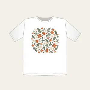 Garden Terrazzo of Leaves and Blossoms T-Shirt in white: An all-over terrazzo of leaves, pebbles and blossoms in terracotta, sage and cream.