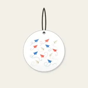 Paper Planes on Dotted Trails Ceramic Ornament in white: Little paper planes trail dotted paths in blue, coral and cream.