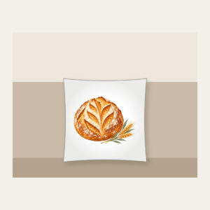Sourdough Loaf and Wheat Sprig Pillow in white: A round scored sourdough loaf with a small wheat sprig in golden brown, cream and sage.