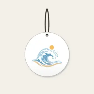 Curling Wave and Little Sun Ceramic Ornament in white: A curling wave in white, pale blue and sand with a small sun disc above.