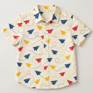 Paper Plane Youth Button-Down Shirt with paper planes and dotted flight paths in navy, red and yellow on cream