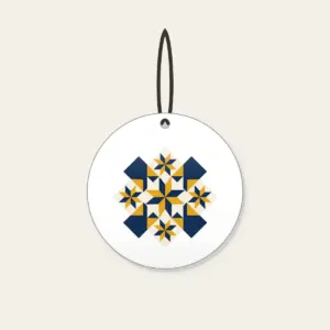 Mustard and Navy Patchwork of Stars Ceramic Ornament in white: A patchwork of stars and diamonds in navy, mustard and cream.