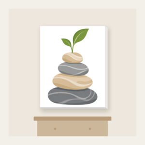 Cairn Stones with a Sprout Canvas Print in white: Stacked cairn stones in grey and sand, topped with a tiny green sprout.