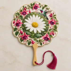 Hummingbird Garden Photo Hand Fan with scalloped fan face with a round window in the centre showing an original sample photograph of a sunlit wildflower meadow, ringed by fuchsia blossoms and one hovering hummingbird in teal and magenta