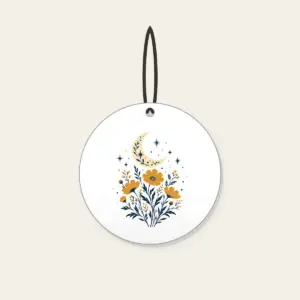 Crescent Moon over Ochre Wildflowers Ceramic Ornament in white: A crescent moon floats over ochre wildflowers and pale star dots on a cream and navy illustration.