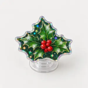 Holly Sprig Magnetic Phone Grip with a holly sprig with red berries and glossy leaves on a deep green ground