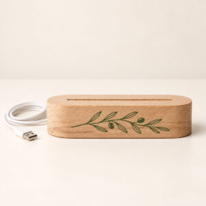 Beech wooden night-light base with an empty top slot, olive-branch decoration and a cable.