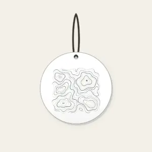 Topographic Contour Lines with a Single Peak Ceramic Ornament in white: Topographic contour lines in slate and cream with one small peak mark.