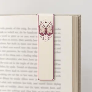 Book Moth Magnet Bookmark with a small moth whose open wings form the pages of a book in plum and cream near the top of the tall narrow bookmark with a thin plum border