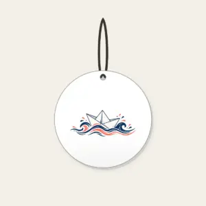 Folded Paper Boat on Navy Waves Ceramic Ornament in white: A folded paper boat on fine-lined waves in navy and coral.