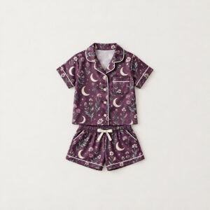 Moon Meadow Kid Satin Pajama Set with all-over crescent moons, wildflowers and tiny stars in plum, mint and cream