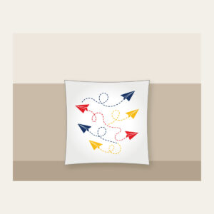 Paper Planes and Dotted Flight Paths Pillow in white: Paper planes trace dotted flight paths across cream in navy, red and yellow.