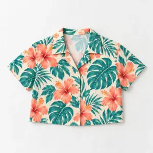 Hibiscus Postcard Cropped Shirt with all-over print of hibiscus flowers and monstera leaves in coral and teal on cream
