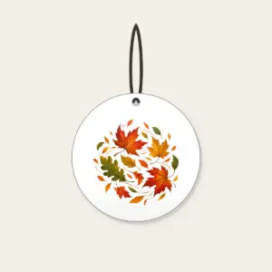 Drifting Autumn Leaves Ceramic Ornament in white: Autumn leaves drift in rust, gold and green.