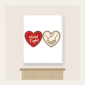 Hold Tight Heart and Hands Canvas Print in white: A red dashed heart marked “Hold Tight” on one side and two clasped cream hands in brown on the other.