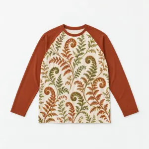 Autumn Fern Raglan Long Sleeve with unfurling ferns in rust and olive on a cream body with solid rust sleeves