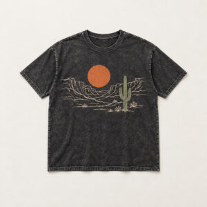 Desert Echo Mineral-Wash Tee with center chest flat screenprint-look artwork: rust-orange sun disc over sparse cream canyon contour lines and one sage cactus silhouette
