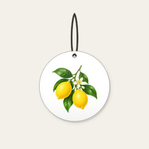 Lemon Branch in Blossom Ceramic Ornament in white: A single lemon branch carries two lemons, glossy leaves and a small blossom in lemon yellow, leaf green and cream.