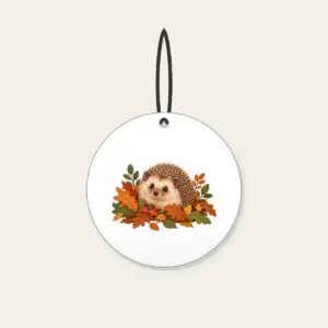 Hedgehog Among Fallen Leaves Ceramic Ornament in white: A small hedgehog wanders among fallen leaves in brown, rust and green.