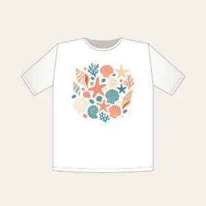 Scattered Shells and Starfish on Sand T-Shirt in white: Coral, cream and teal shells and starfish are tossed across a pale sand background.