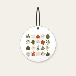 Pressed Leaf Specimen Grid Ceramic Ornament in white: A grid of pressed leaves and blossoms in green, rust and cream with tiny index lines.