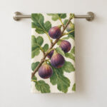 Fig Branch Hand Towel with a fig branch with plump purple figs and broad green leaves on a cream ground