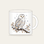 Snowy Owl in Snowfall Mug in white: A snowy owl on a branch in white, slate and amber with falling snowflakes.
