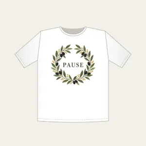 Olive Branch Wreath with PAUSE T-Shirt in white: An olive branch wreath with dark fruits and ochre dots circles the word PAUSE in simple deep green serif letters.