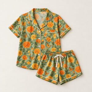 Marigold Meadow Satin Short Set with all-over repeat of marigolds and small butterflies in orange and yellow on a sage ground