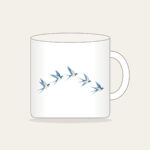 Five Swallows in a Gentle Arc Mug in white: Five swallows in cream and sky blue fly in an arc along a fine dotted trail.