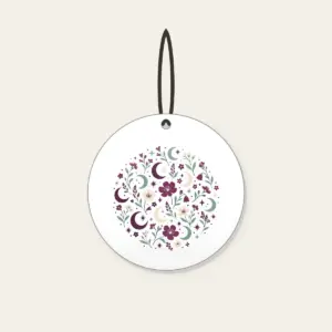 Crescent Moons and Wildflowers in Plum Ceramic Ornament in white: Crescent moons, wildflowers and tiny stars repeat in plum, mint and cream.