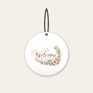 Rose Gold Welcome Wildflower Garland Ceramic Ornament in white: The word “Welcome” in rose gold mirror lettering, with a blush and sage wildflower garland curling into one corner.