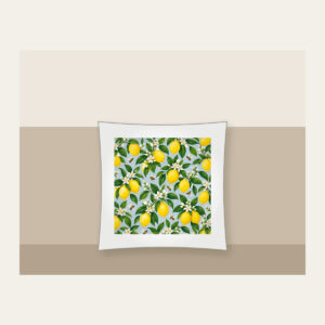Lemon and Bee Garden Repeat Pillow in white: A repeat of lemons, glossy leaves and tiny bees in yellow and green on a pale blue-grey ground.