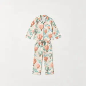 Hot Air Balloon Kids Satin Pajamas with all-over repeat of striped hot air balloons drifting through soft clouds in coral, teal and cream