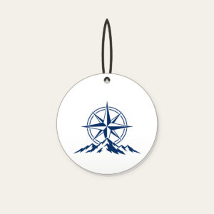 Compass Rose over a Ridge Line Ceramic Ornament in white: A compass rose rests over a simple ridge line in navy and white.